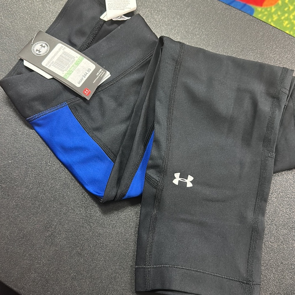 Two pairs of UA leggings
